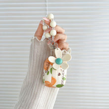 Charming Daisy Chain Supports  AirPods Case with Good Luck Charm